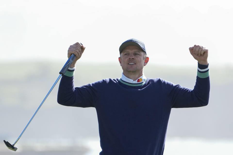 Justin Rose, of England, reacts after making a par putt on the 18th green of the Pebble Beach Golf Links to win the AT&T Pebble Beach Pro-Am golf tournament in Pebble Beach, Calif., Monday, Feb. 6, 2023. (AP Photo/Godofredo A. Vásquez)