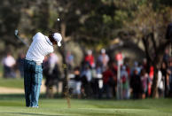 Rory Mcilroy of Northern Ireland (R) plays a shot during the third round of the Abu Dhabi Championship at the Abu Dhabi Golf Club on January 28, 2012. AFP PHOTO/KARIM SAHIB (Photo credit should read KARIM SAHIB/AFP/Getty Images)