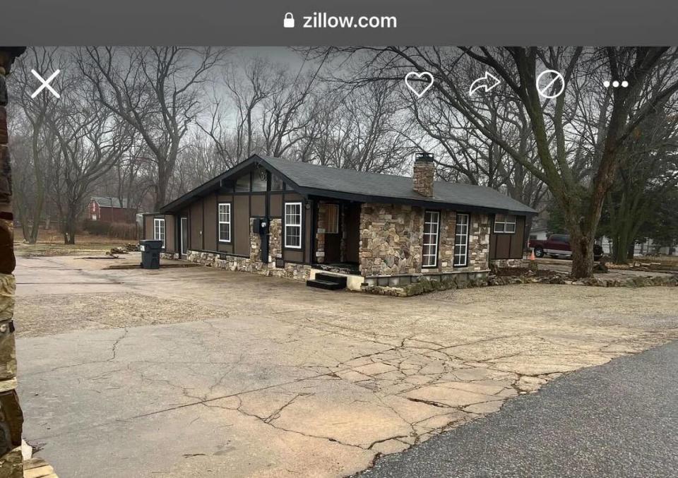 The unassuming exterior hides a colorful interior. Screen grab from Zillow.com