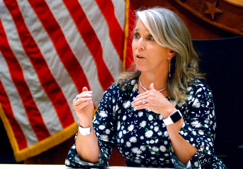 New Mexico Gov. Michelle Lujan Grisham speaks at a news conference in Santa Fe, July 29, 2021. Grisham wants to make teacher salaries the highest among neighboring states. Tapping into a glut of oil and gas tax revenue, the state is proposing raising educator salaries by between 7% and 20%, depending on their role and level of experience, at a cost of around $275 million.