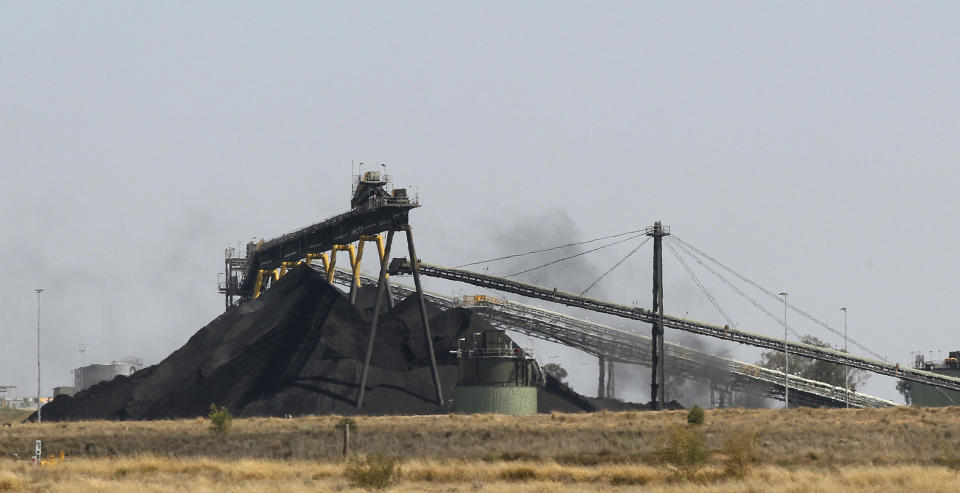 In this Sept. 11, 2012, file photo, coal is stacked at a Whitehaven Coal mine outside Narrabri, Australia. Australia was the worst climate performer among comparable developed countries since the 2015 Paris Agreement imposed binding commitments to limit global warming, a think tank reported on Thursday, Oct. 21, 2021, ahead of an important conference in Scotland later this month. (AP Photo/Rob Griffith, File)