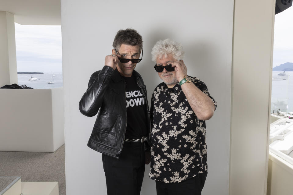 Ethan Hawke, left, and director Pedro Almodovar pose for portrait photographs for the film 'Strange Way of Life' at the 76th international film festival, Cannes, southern France, Thursday, May 18, 2023. (Photo by Joel C Ryan/Invision/AP)