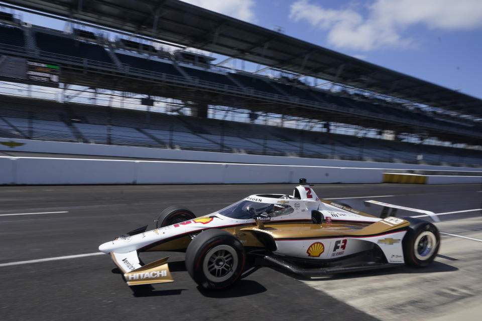 Josef Newgarden pulls out of the pits during testing at Indianapolis Motor Speedway, Thursday, April 21, 2022, in Indianapolis. (AP Photo/Darron Cummings)