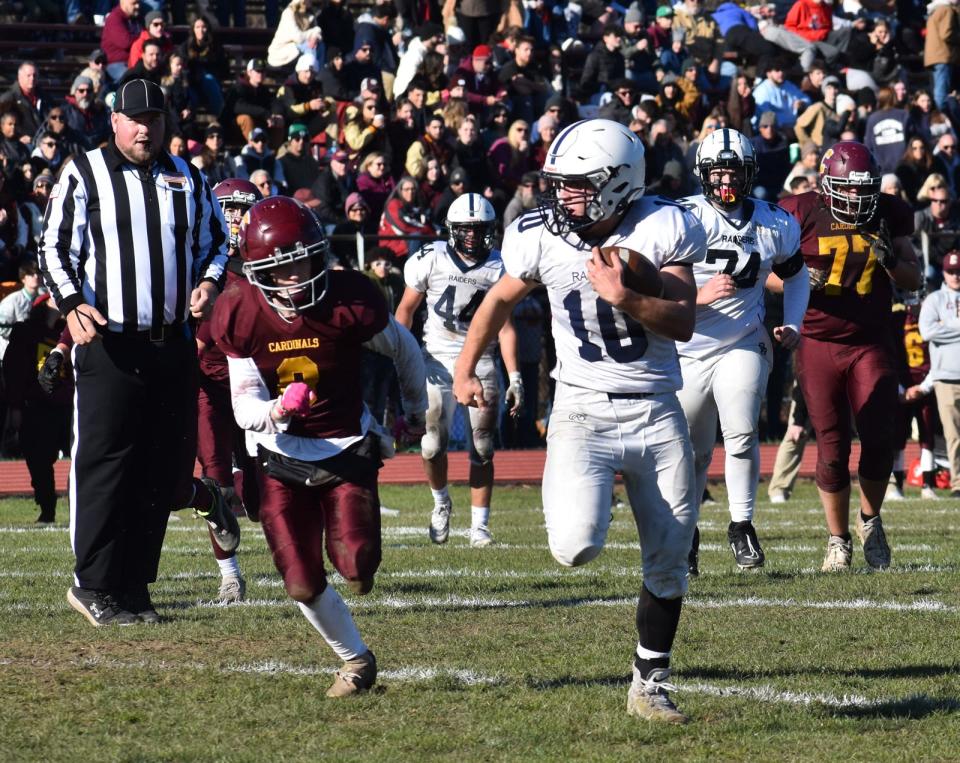 Somerset Berkley's Wyatt Figueiredo sprints into the open for a touchdown in in Thursday's Thanksgiving Day game.