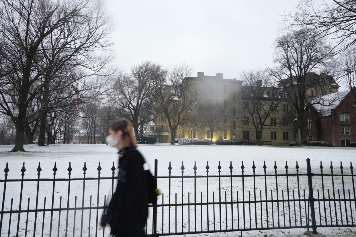 A layer of snow covered the lawn in front of Columbus Public Health on Jan. 25, 2023, as a winter storm made it’s way across central Ohio.