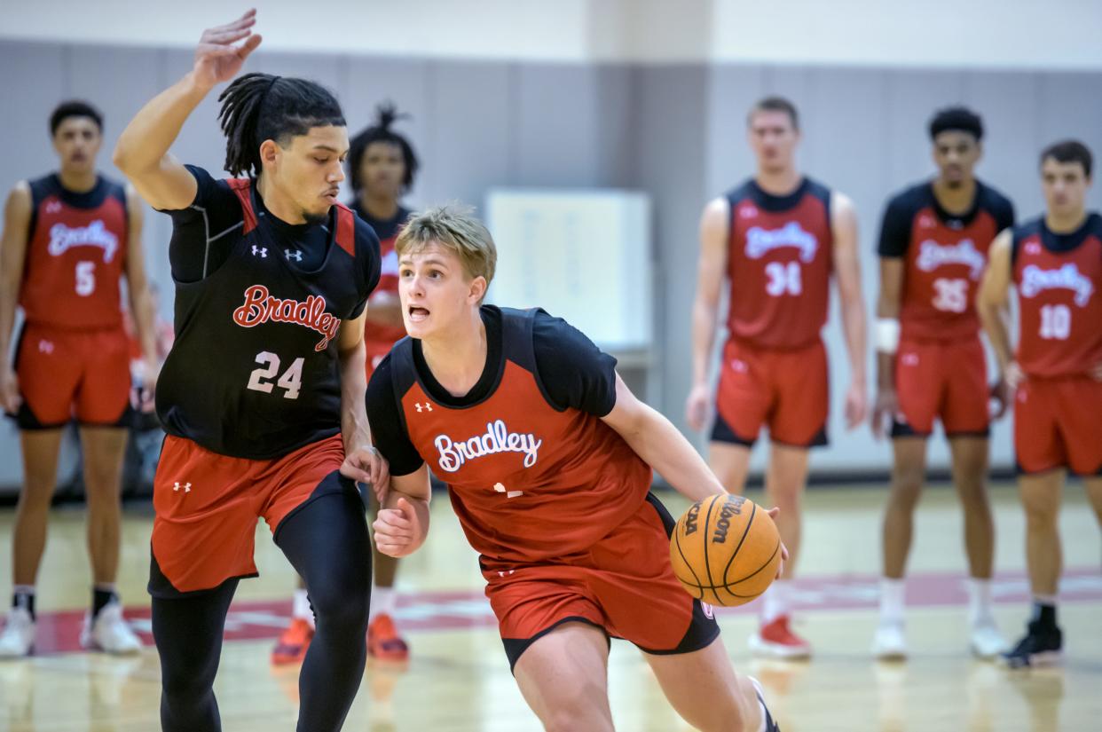 Bradley newcomer Almar Atlason (1) moves against sophomore transfer Kyle Thomas during practice Monday, Oct. 2, 2023 at Renaissance Coliseum in Peoria.