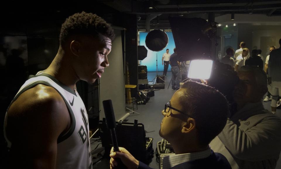 Milwaukee Bucks' Giannis Antetokounmpo answers questions during media day at the NBA basketball team's new arena Monday, Sept. 24, 2018, in Milwaukee. (AP Photo/Morry Gash)