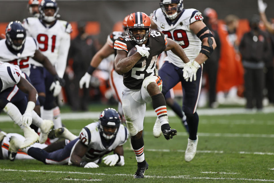 Cleveland Browns running back Nick Chubb (24) rushes for a 9-yard touchdown during the second half of an NFL football game against the Houston Texans, Sunday, Nov. 15, 2020, in Cleveland. (AP Photo/Ron Schwane)