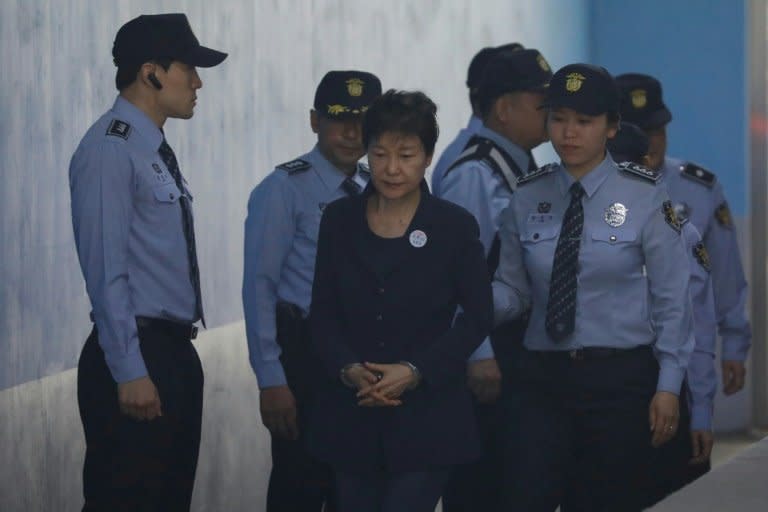 Handcuffed and on her way to court, the fall from grace for ousted South Korean president Park Geun-hye has been steep