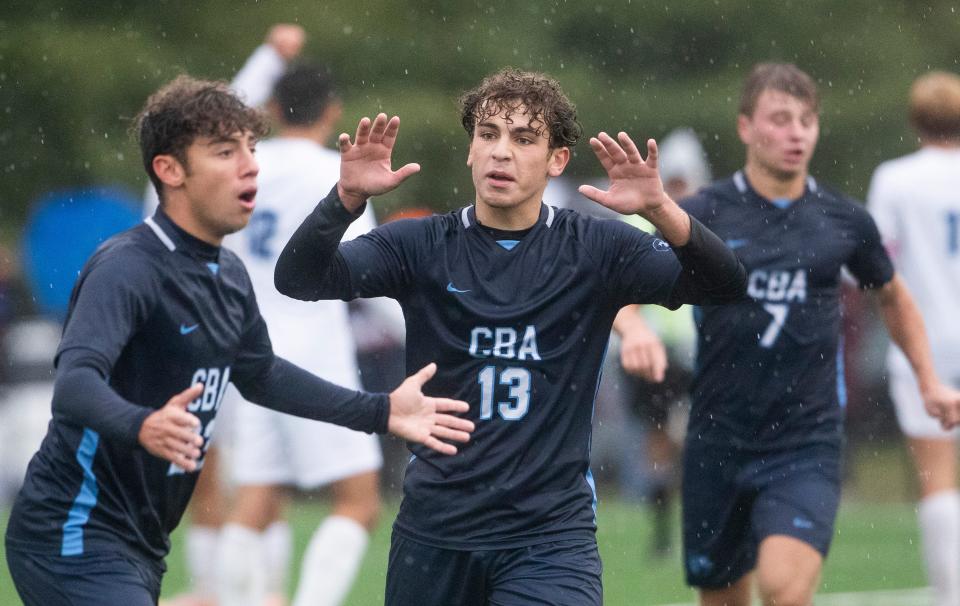 CBA Dylan Millevoi looks to bench for confirmation that his overtime goal counted before celebrating.  Christian Brothers Academy  Soccer defeats Freehold Township 1-0 in OT in Middletown, NJ on October 3, 2022.