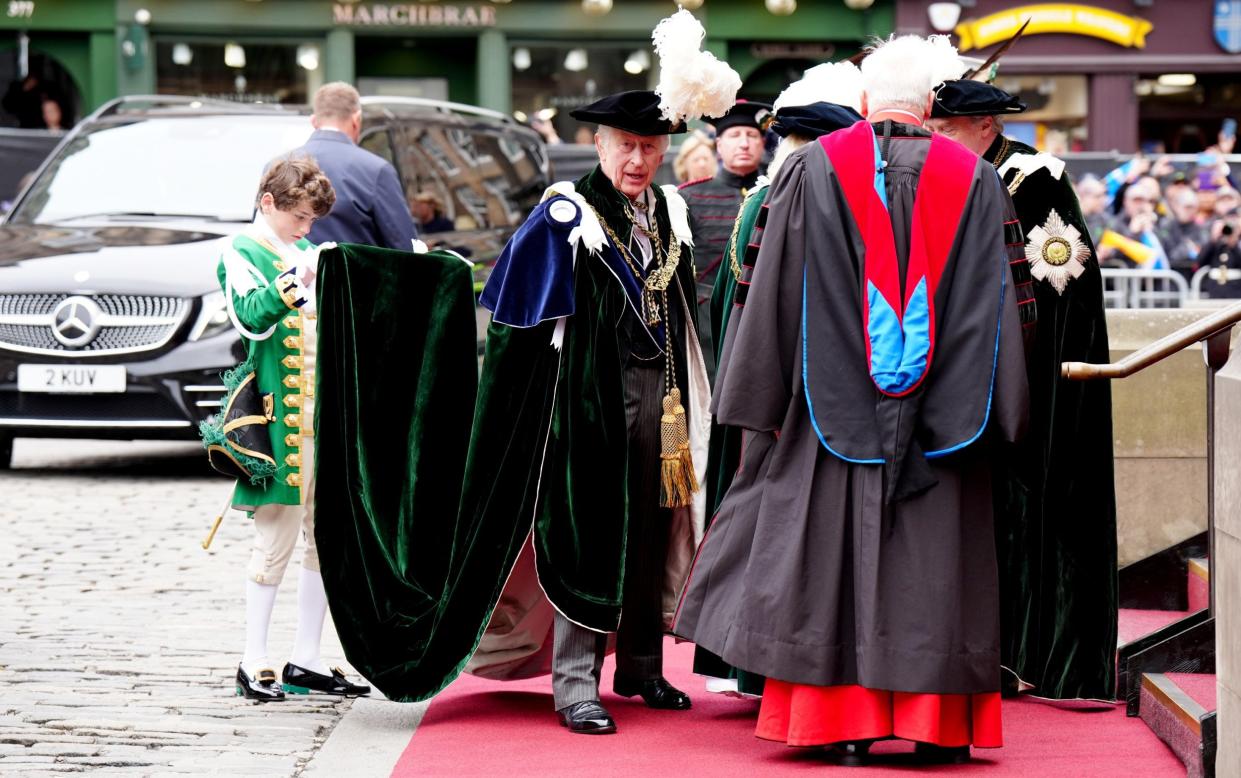 The King arrives at the ceremony where he appointed his younger brother, the Duke of Edinburgh, to the order to mark his 60th birthday