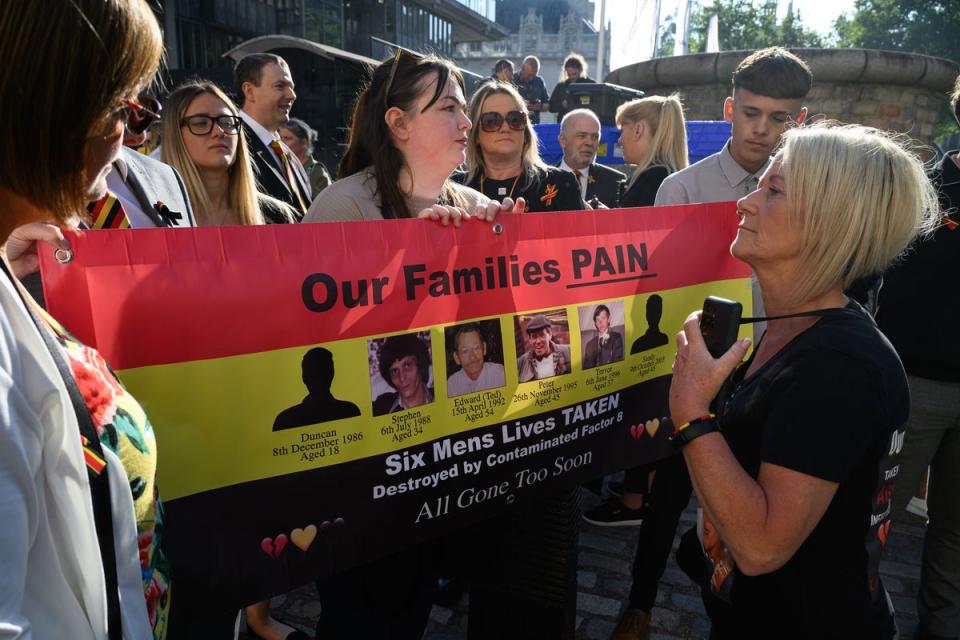 Families affected by the infected blood scandal in London on Monday (Getty Images)