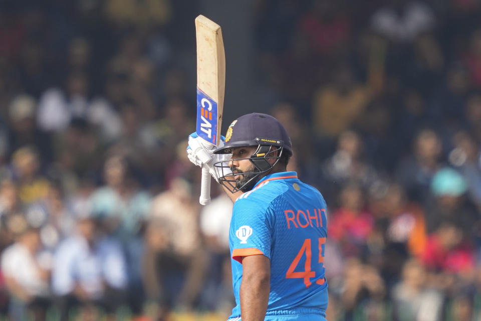 India's Rohit Sharma celebrates scoring a half century during the Asia Cup cricket match between Sri Lanka and India in Colombo, Sri Lanka, Tuesday, Sept. 12, 2023. (AP Photo/Eranga Jayawardena)