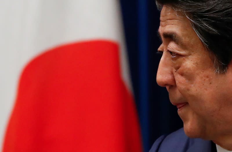 Japan's Prime Minister Shinzo Abe attends a news conference on Japan's response to the coronavirus outbreak at his official residence in Tokyo