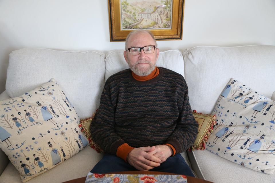 Portsmouth resident Mark Brighton, seen at home Thursday, March 9, 2023, is sharing his story after a spending 24 hours in the emergency room at Portsmouth Regional Hospital recently.