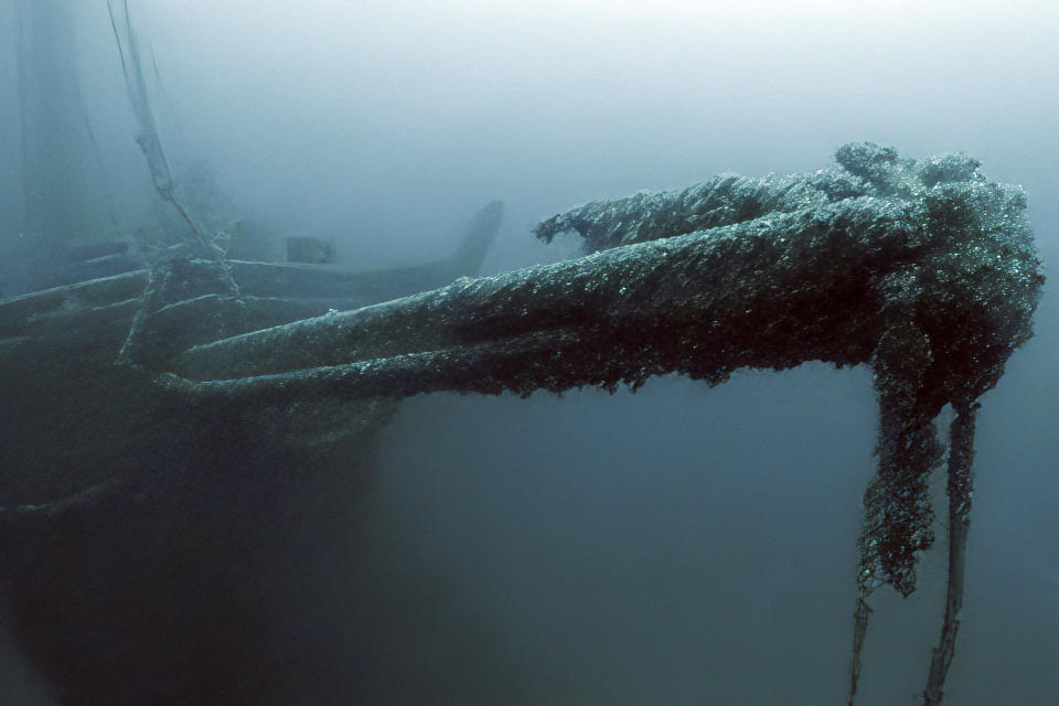 In this image taken from video provided by the Thunder Bay National Marine Sanctuary, the bowsprit of the Ironton is seen in Lake Huron off Michigan's east coast in a June 2021 photo. Searchers have found the long-lost Great Lakes ship that came to a tragic end. Officials with the sanctuary in Alpena, Mich,, say they've located the Ironton, a freight schooner that plunged to the bottom of Lake Huron in 1894. The Ironton collided with another vessel in rough seas. Reports at the time said the seven-member crew scrambled into a lifeboat but it was tethered to the ship and pulled down. Five crewmen died. (Thunder Bay National Marine Sanctuary via AP)