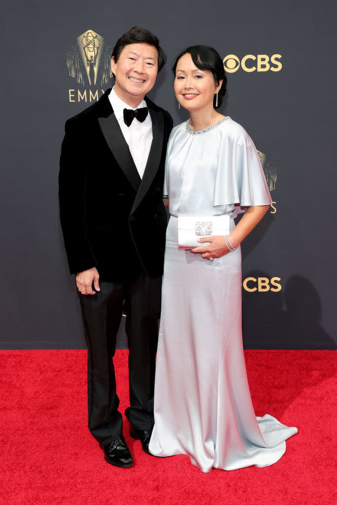 Ken Jeong and Tran Jeong on the red carpet: Ken wears a standard black tux and Tran wears a gorgeous light blue satin gown