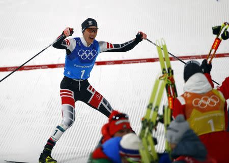 Nordic Combined Events - Pyeongchang 2018 Winter Olympics - Men's Team 4 x 5 km Final - Alpensia Cross-Country Skiing Centre - Pyeongchang, South Korea - February 22, 2018 - Mario Seidl of Austria celebrates with his teammates. REUTERS/Dominic Ebenbichler