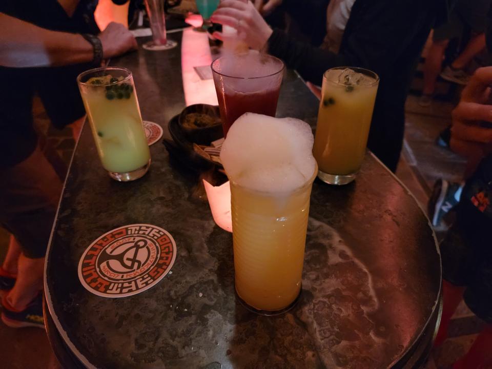 drinks from oga's cantina sitting on a high top bar table