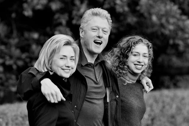 <p>Frank Johnston/The The Washington Post via Getty </p> Hillary, Bill and Chelsea Clinton on their way to Camp David on Nov. 26, 1997