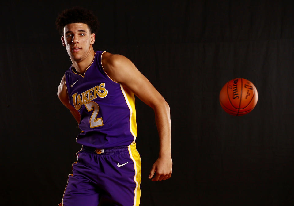 Lonzo Ball feeds the man running the wing rather than taking it himself. (Getty Images)