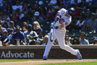 Chicago Cubs' Ian Happ hits a three-run home run during the first inning of a baseball game against the Cincinnati Reds, Monday, Sept. 6, 2021, in Chicago. (AP Photo/Matt Marton)
