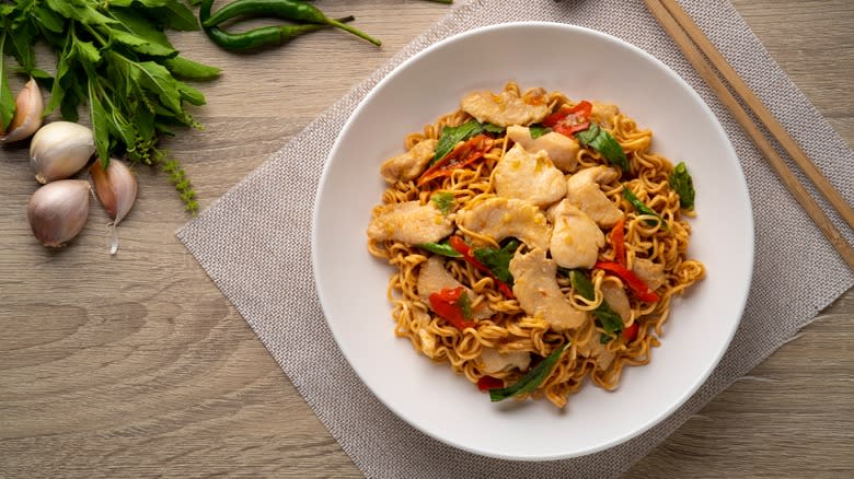 Chicken noodle stir fry on plate 