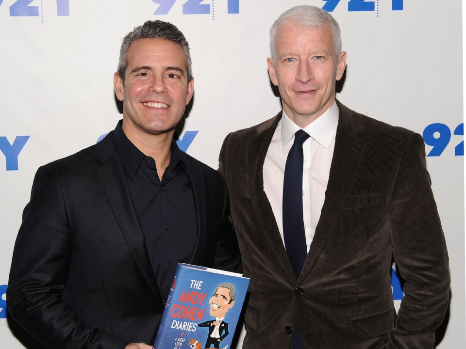 Andy Cohen (L) and Anderson Cooper attend 92nd Street Y Presents: Andy Cohen in Conversation with Anderson Cooper at 92nd Street Y on November 14, 2014 in New York City