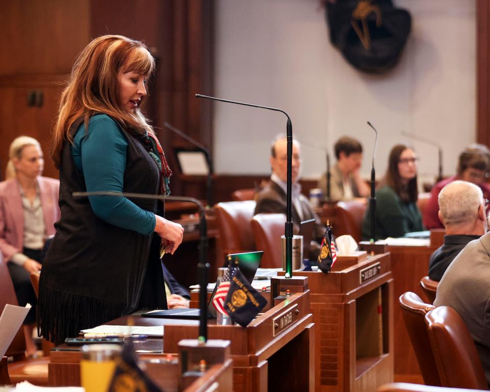 Sen. Kim Thatcher. R-Keizer, speaks on the Senate floor Tuesday about a proposal that would make Pacific Standard Time permanent.