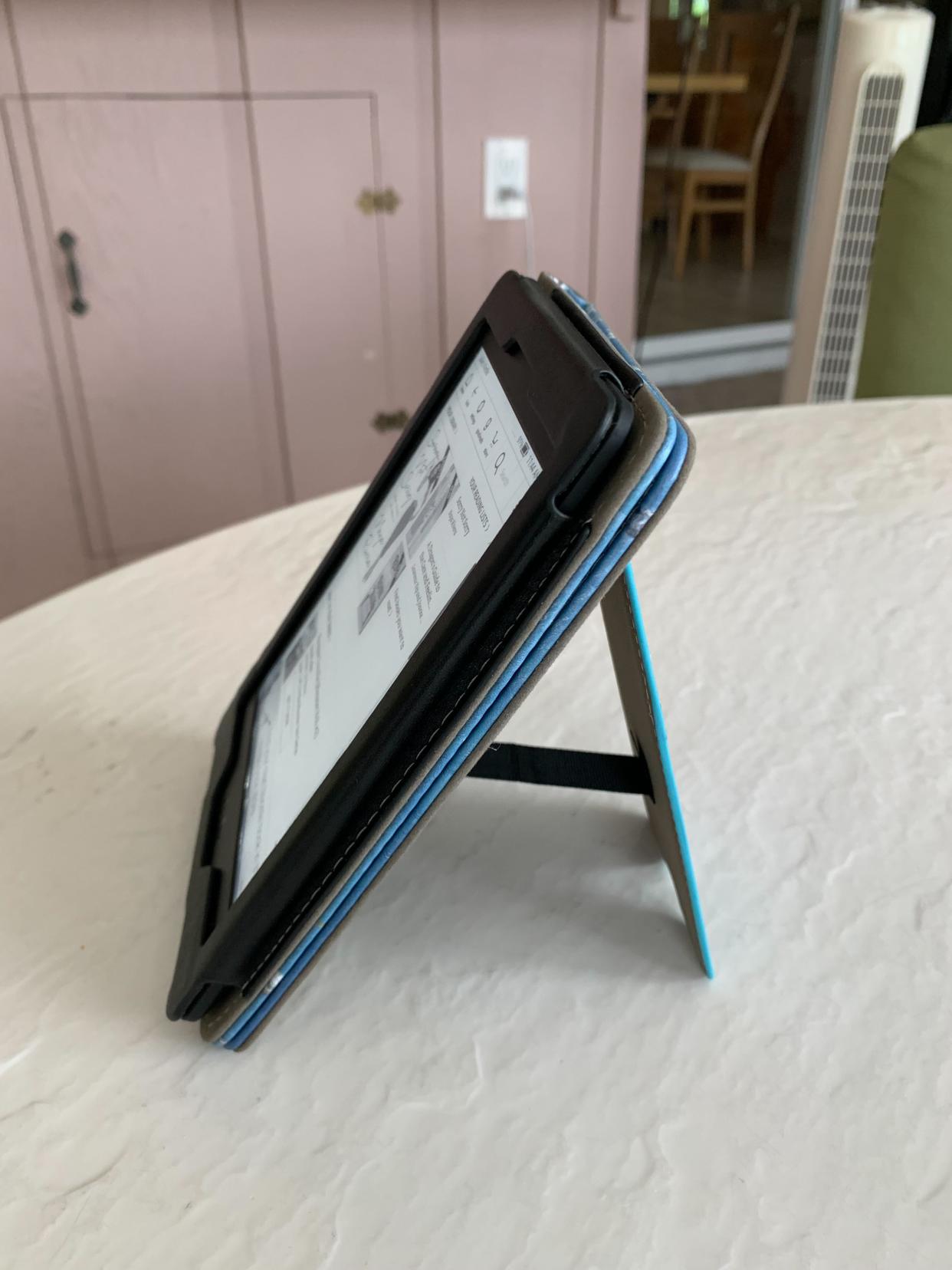 Associate reporter Mili Godio upgraded to the Fintie Stand Case for her Kindle Paperwhite and she appreciates its soft, synthetic leather casing. (Courtesy Mili Godio)