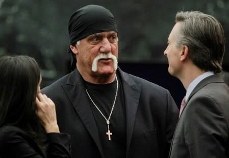 Terry Bollea (C), aka Hulk Hogan, speaks with people before his trial against Gawker Media, in St Petersburg, Florida March 17, 2016. REUTERS/Dirk Shadd/Tampa Bay Times/Pool via Reuters