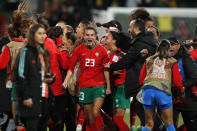 Morocco's Rosella Ayane, center, celebrates with teammates after the Women's World Cup Group H soccer match between Morocco and Colombia in Perth, Australia, Thursday, Aug. 3, 2023. (AP Photo/Gary Day)