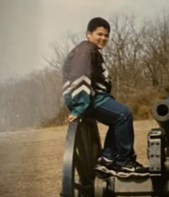 The author sitting on a cannon at Gettysburg Battlefield, age 11. (Photo: Courtesy of Matthieu Chapman)