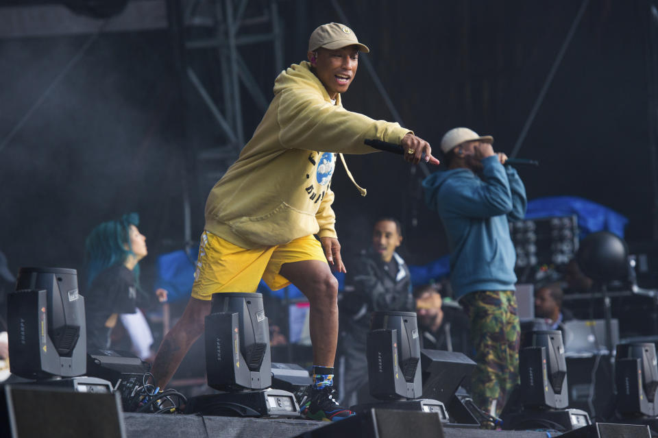 FILE - In this June 3, 2018 file photo, Pharrell Williams of N.E.R.D. performs at The Governors Ball Music Festival at Randall's Island Park in New York. The Recording Academy’s Task Force on Diversity and Inclusion is a launching a new initiative announced Friday, Feb. 1, 2019, to create and expand more opportunities to female music producers and engineers. More than 200 musicians, labels and others have already pledged, including Lady Gaga, Justin Bieber, Pearl Jam, Pharrell and Ariana Grande. (Photo by Scott Roth/Invision/AP, File)