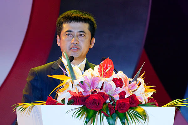 <b>7. Ding Shizhong, 42</b><br><br> Fortune: $2.29 billion <br> Company: ANTA Sports Products<br> <br> Ding Shizhong, 42, is the youngest person on the list of China's 10 richest billionaire NPC members. He has been in the Congress since 2008. <br><br> Ding, a high school dropout, started selling sports shoes when he was 17 and set up his own company in 1991. He joined ANTA in 1994 and is today its executive chairman and CEO and the driving force behind the company's success in China's competitive sports goods market. <br><br>In 2008, Ding won the Ernst & Young Entrepreneur of the Year award in the consumer products category for his achievements in building ANTA into one of China's most recognizable brands. <br><br> Banking on China's growing retail sector, the Hong Kong-listed firm operated 7,700 outlets in 2011, opening 229 new stores that year. ANTA has made headlines in the past couple of years for securing sponsorship of star athletes like the American basketball player Kevin Garnett, as well as acquiring rights to the Fila trademark in mainland China.<br><br> Despite the company reporting a 12 percent rise in 2011 profits, many analysts hold a negative outlook for sportswear firms in general and expect ANTA to suffer from high retail discounts, inventory clean-up and intense competition this year. <br><br> Ding has been a member of the Organizing Committee of All-China Sports Federation since 2009 and deputy chairman of the China Sporting Goods Federation since 2010.