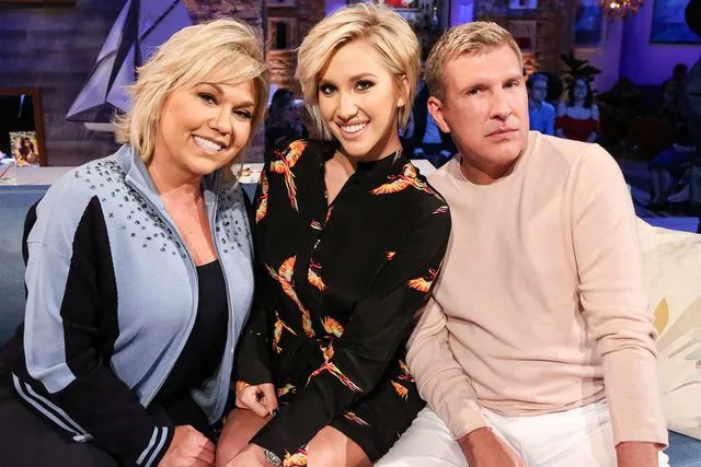 Vivian Zink/NBC/NBCU Photo Bank via Getty Julie Chrisley, Savannah Chrisley and Todd Chrisley