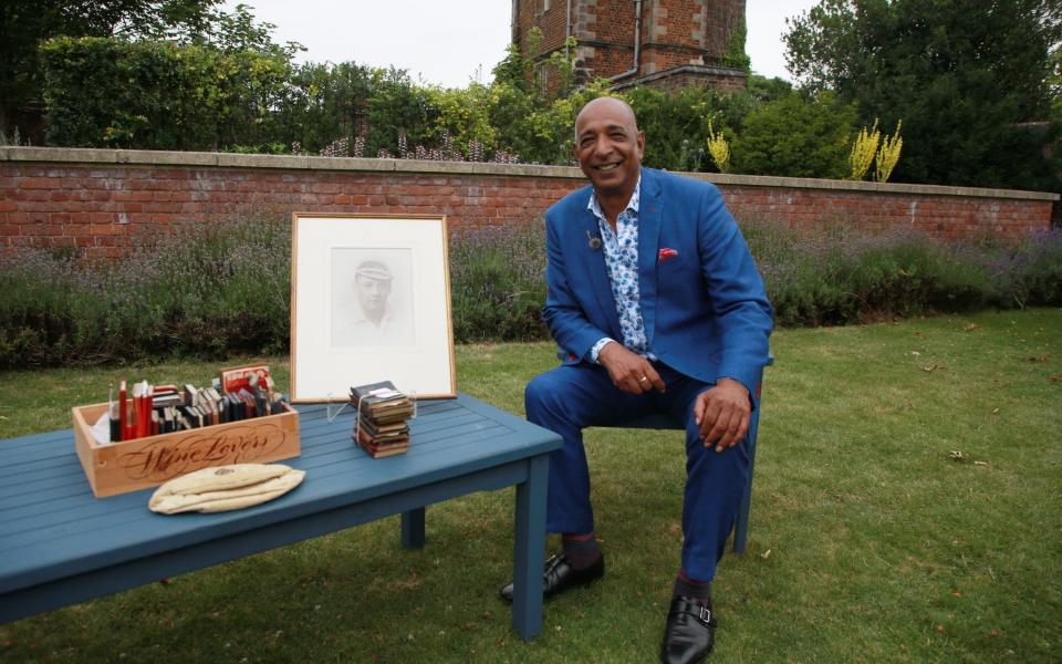 Raj Bisram with a collection of Aston Villa football memorabilia on an episode of Antiques Roadshow - Antiques Roadshow/BBC Studios/Callum Lawrence