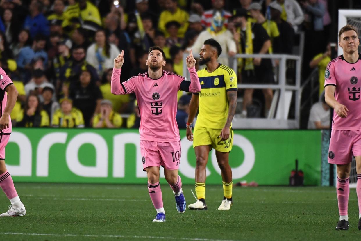 Lionel Messi celebrates after scoring a goal during the Concacaf Champions Cup first leg game against Nashville SC at GEODIS Park.