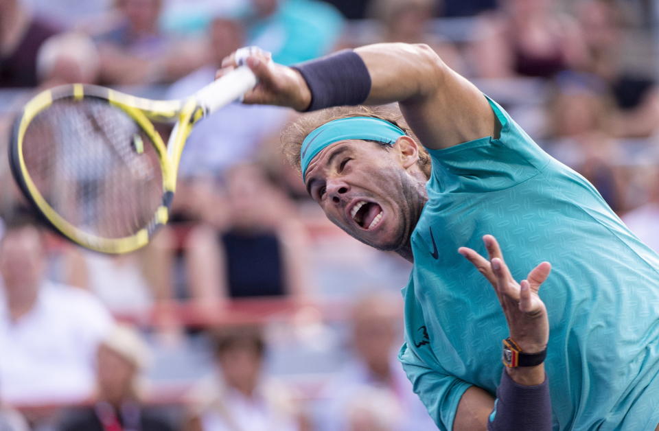 Rafael Nadal, of Spain, serves to Guido Pella, of Argentina, during the Rogers Cup men’s tennis tournament Thursday, Aug. 8, 2019, in Montreal. (Paul Chiasson/The Canadian Press via AP)