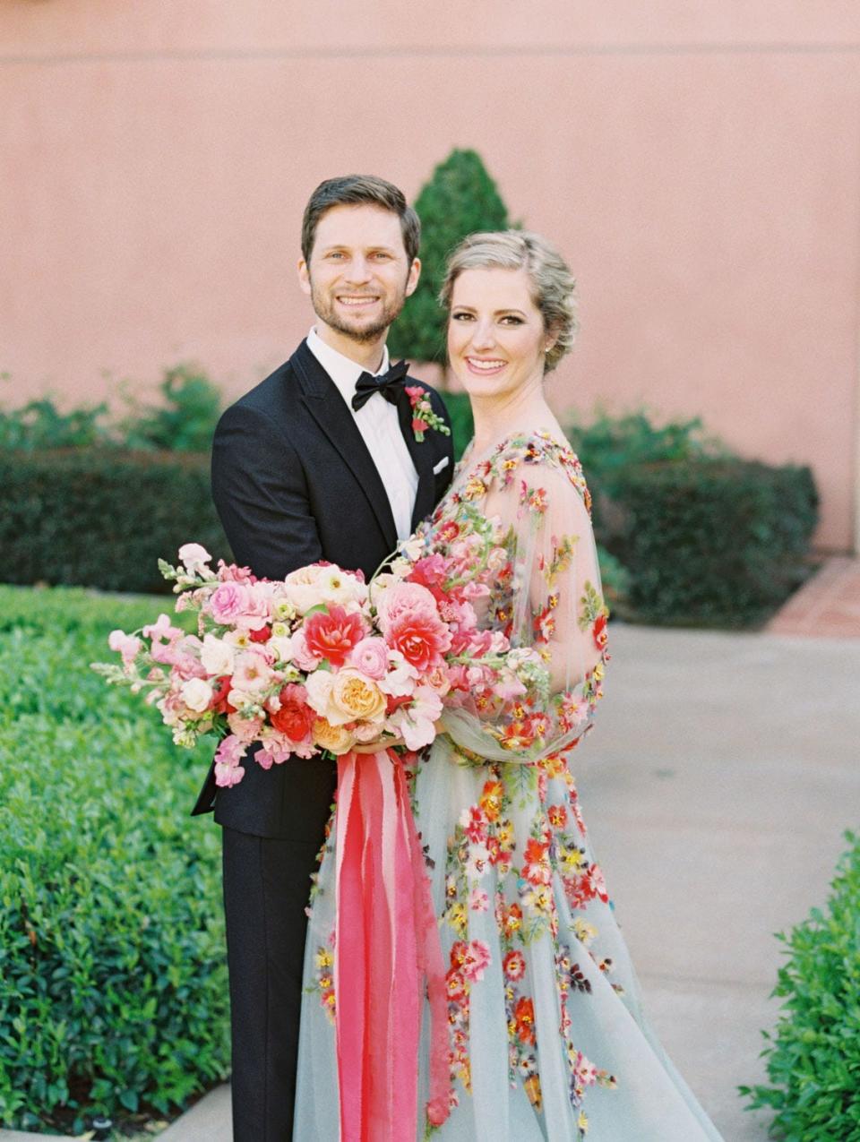 For Cavin Elizabeth, a San Diego-based wedding photographer who married her husband in 2019, a white dress "did not feel like it honored my personality," she says. Instead, she opted for a blue gown with vibrant floral patterns.