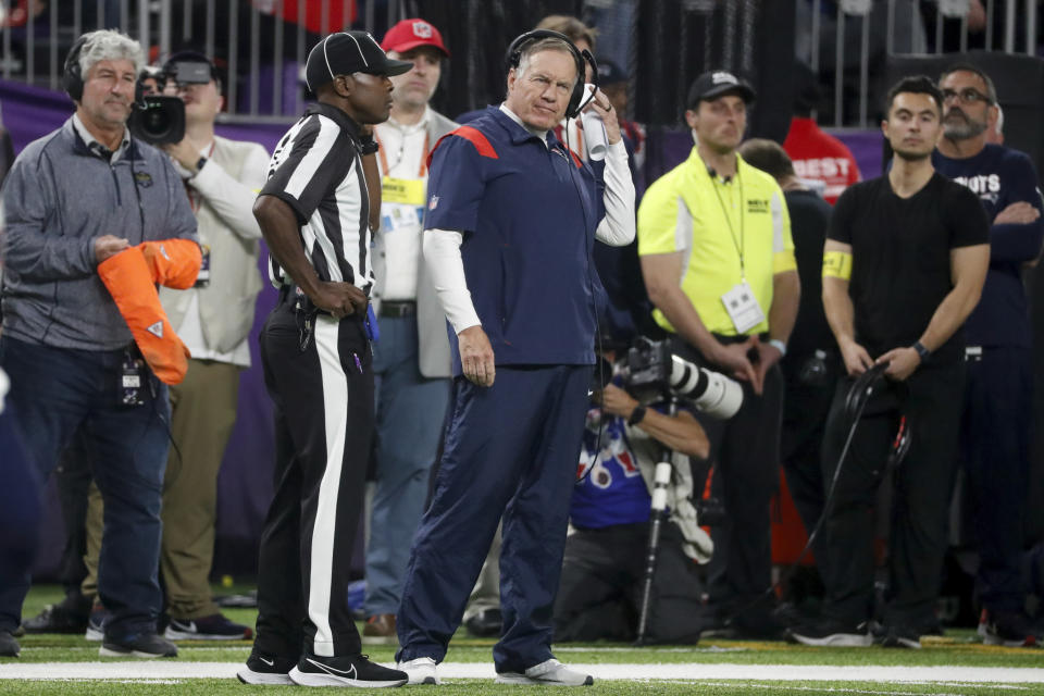 New England Patriots head coach Bill Belichick watches from the sideline during the first half of an NFL football game against the Minnesota Vikings, Thursday, Nov. 24, 2022, in Minneapolis. (AP Photo/Bruce Kluckhohn)