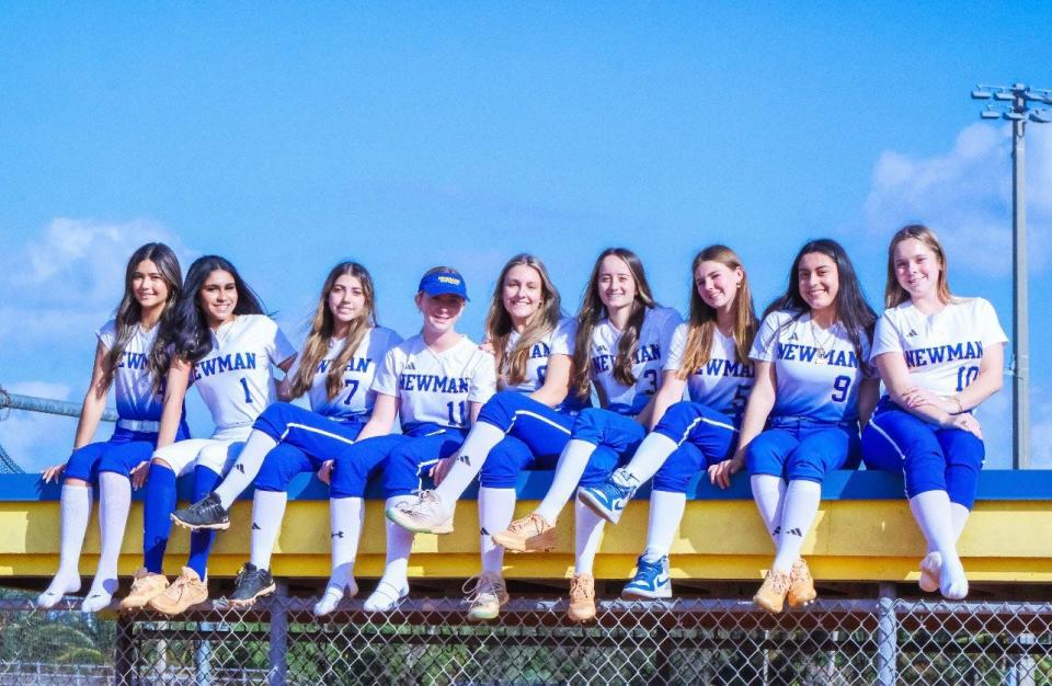 Karis Taleff (far left) is tied for the team record in runs, is second in RBIs and home runs, and has the third-best on-base percentage for the Cardinal Newman Crusaders this season.