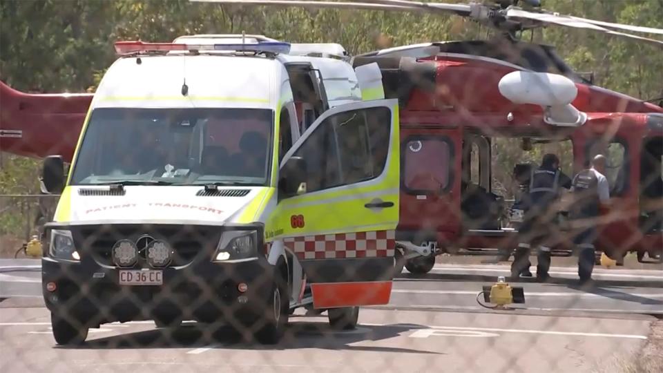 This image made from video shows a helicopter and ambulance involved in rescue mission, following an aircraft crash, in Darwin, Australia, Sunday, Aug. 27, 2023. According to their unit, three Marines died in the crash: Corporal Spencer R. Collart, 21; Captain Eleanor V. LeBeau, 29, and Major Tobin J. Lewis, 37.