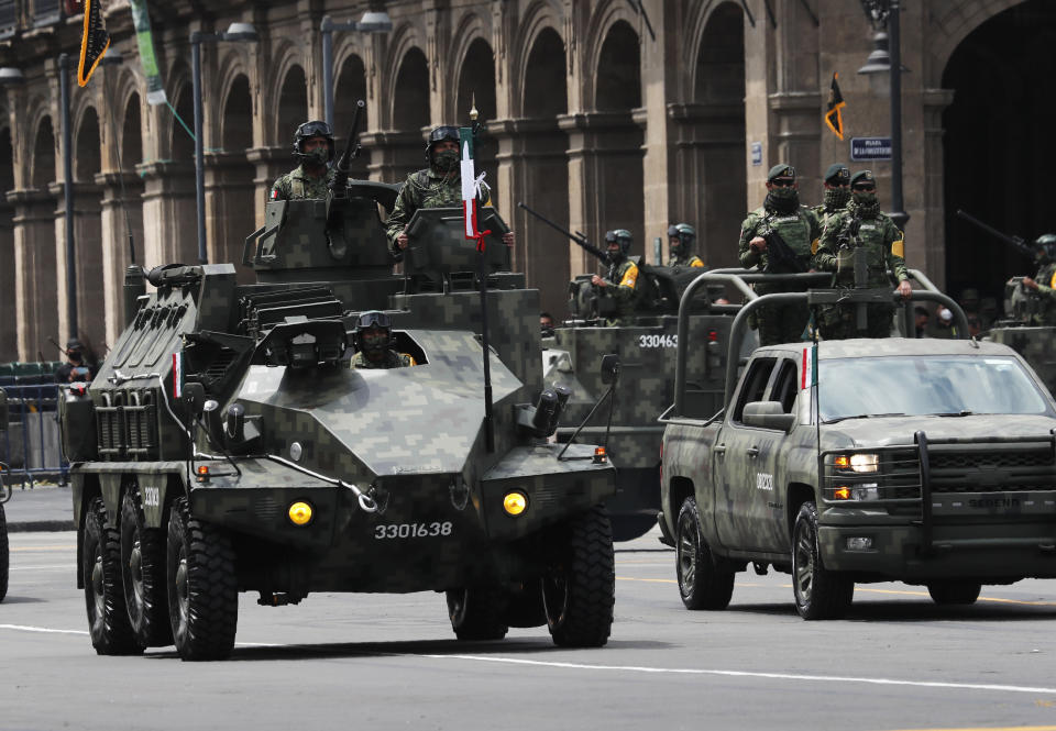 Military vehicles drive during the annual Independence Day military parade in Mexico City’s main square of the capital, the Zócalo, Wednesday, Sept. 16, 2020. Mexico celebrates the anniversary of its independence uprising of 1810. ( AP Photo/Marco Ugarte)