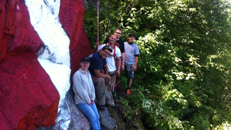 White crosses on Sugarloaf mountain repainted by Campbellton woman