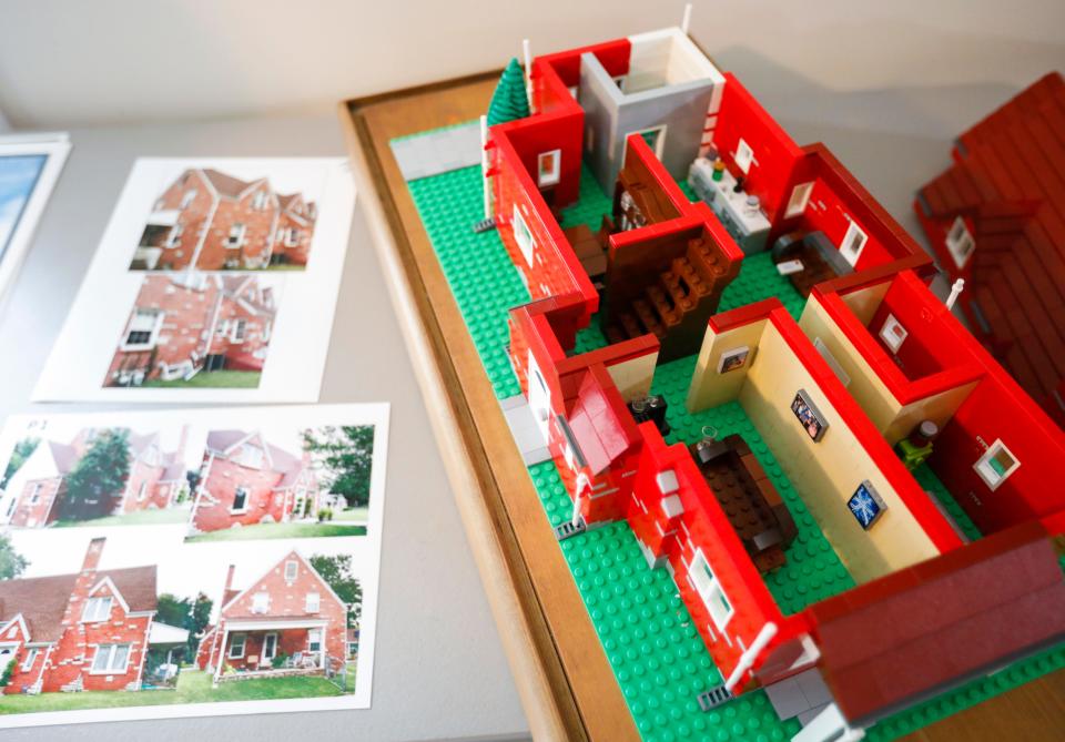 A Lego house with interior decorations Harold Moody built at his home.