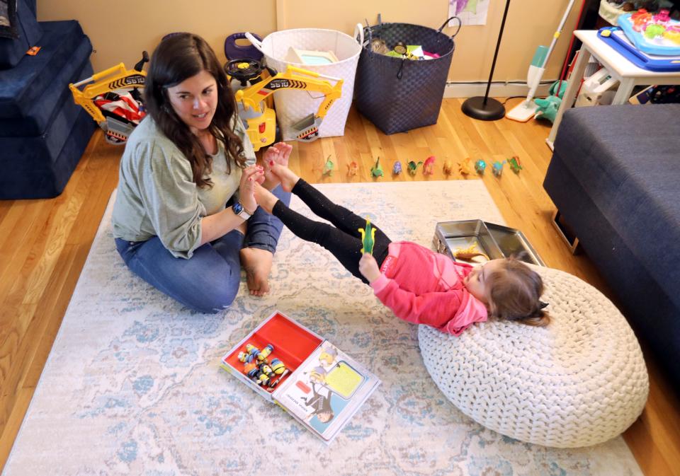 Danielle DeCristoforo with her daughter, Avery, 2, in their New City, N.Y. home May 5, 2023. She is a certified life coach for new moms.