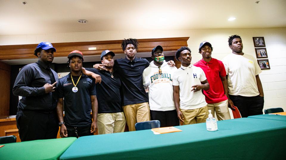 Seven Dunbar High School football players signed letters of intent to play at the next level on Tuesday, April 19, 2022.  