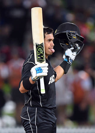 Cricket - ODI - New Zealand vs England - Seddon Park, Hamilton, New Zealand, February 25, 2018. New Zealand's Ross Taylor celebrates reaching his century during the one-day international match. REUTERS/Ross Setford