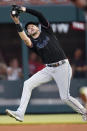 Miami Marlins third baseman Brian Anderson catches a fly ball by Atlanta Braves' Dansby Swanson during the fourth inning of a baseball game Friday, May 27, 2022, in Atlanta. (AP Photo/John Bazemore)